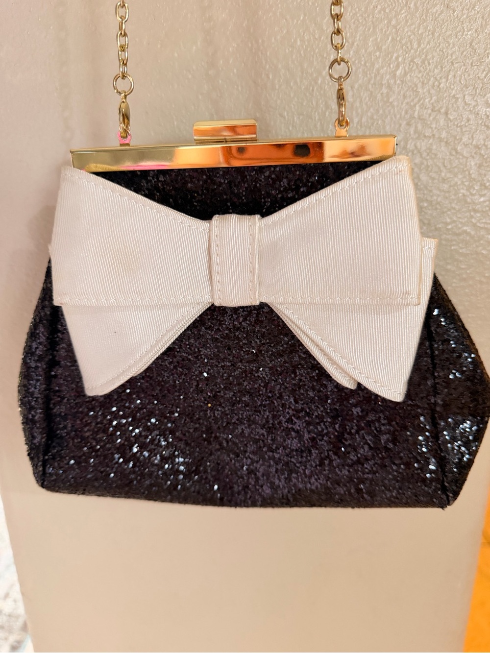 Charming Charlie Black Sequin Clutch with Cream Bow and Gold Chain